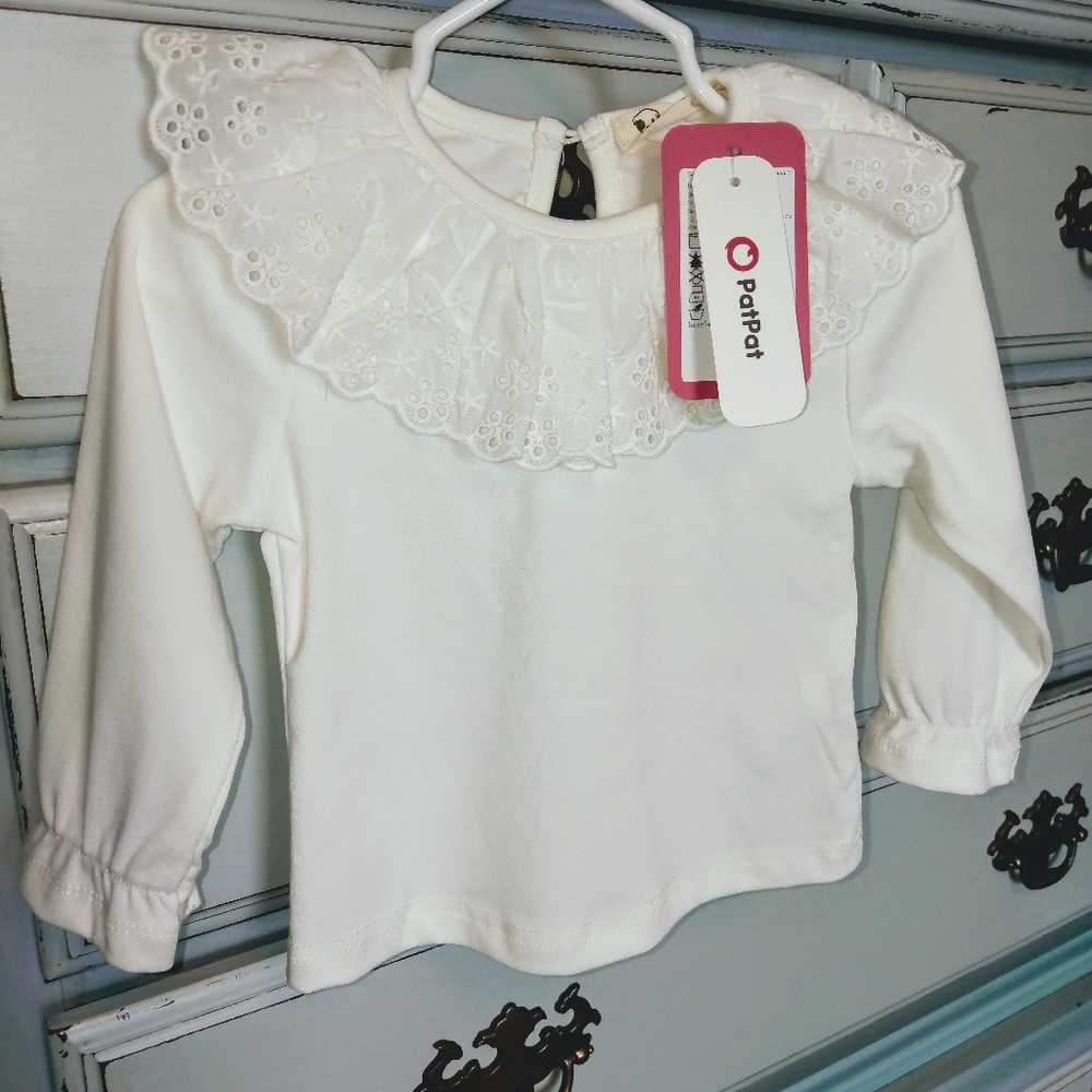 White top with eyelet lace collar,ruffle cuffs NWT